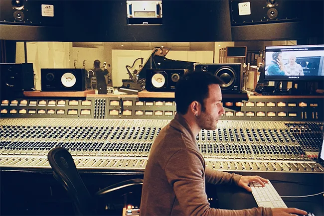 Guillermo at a large-format recording console